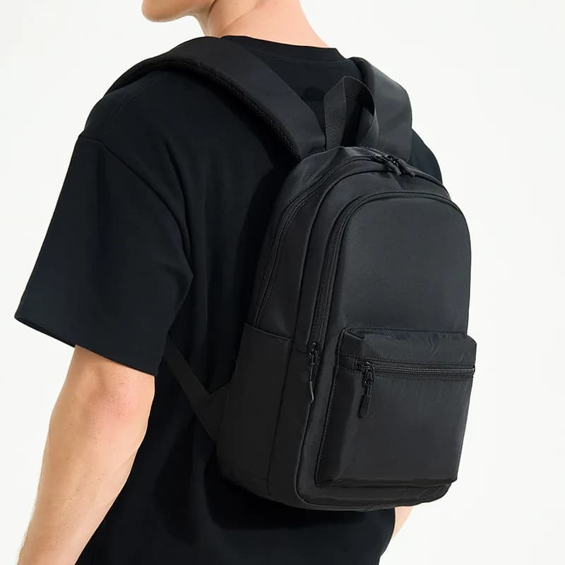 Zaino impermeabile piccolo da pendolare leggero nero da uomo Mini borsa da scuola per studenti da viaggio sportivo casual