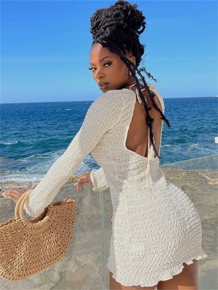 Women's casual dresses sexy hot girls bubble solid color round neck big backless long sleeved hip hugging dress