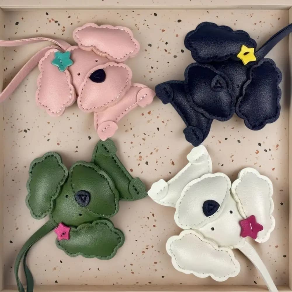 PU Teddy Dog leather bag pendant with wavy ears – Nice pendant with curly hair clip with bow/star, adorable bag accessory