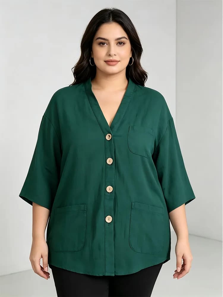 Plus Size Green Linen Blouse for Curvy Women. V-neck half sleeve button shirt with multi pockets. Oversized loose fit perfectly