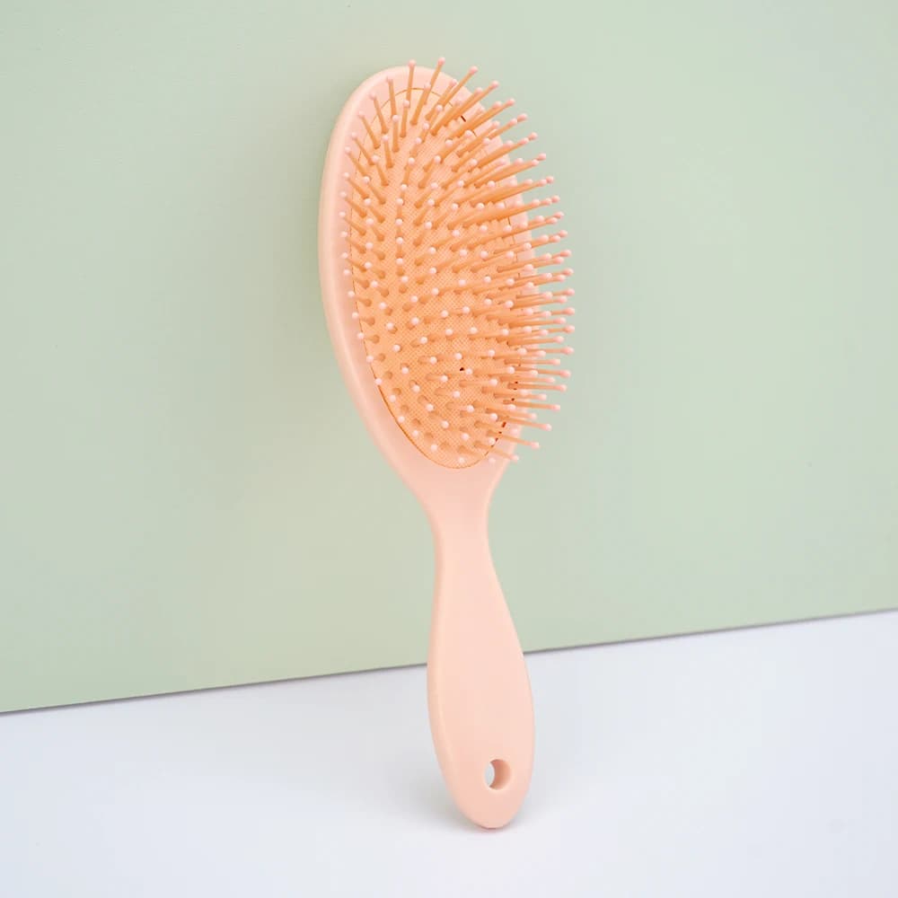 Spazzola per capelli rosa pastello con cuscino d'aria - Setole morbide in nylon con punte arrotondate, manico ergonomico per districare delicatamente e massaggiare il cuoio capelluto