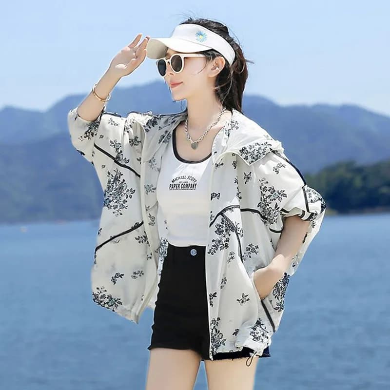 Cappotto per protezione solare da donna floreale alla moda 2025 Camicette estive sottili e traspiranti in chiffon Coreano allentato a maniche lunghe con cappuccio Abbigliamento donna