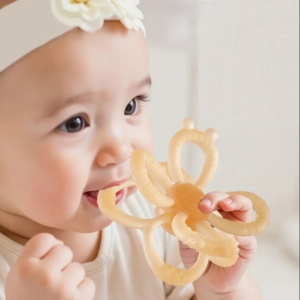 Giocattolo per massaggiagengive in silicone per bambini a forma di fiore Anello per dentizione per lo sviluppo Giocattoli sensoriali per bambini Afferrare la forma delle ruote
