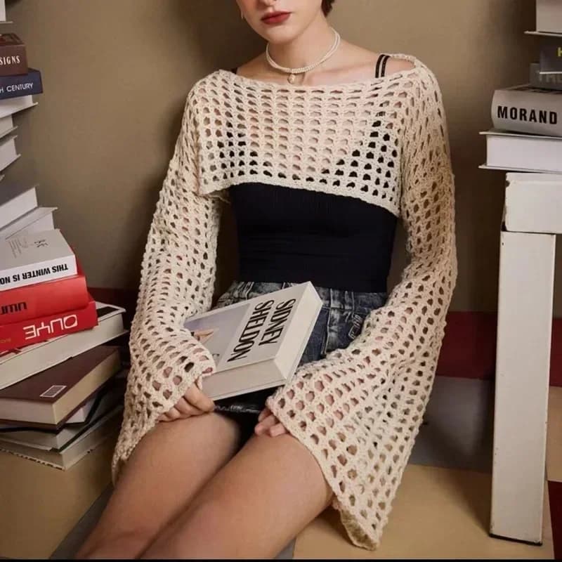 Maglione lavorato a maglia corto scavato primavera estate Nuovi pullover tinta unita con maniche svasate Streetwear Top da donna