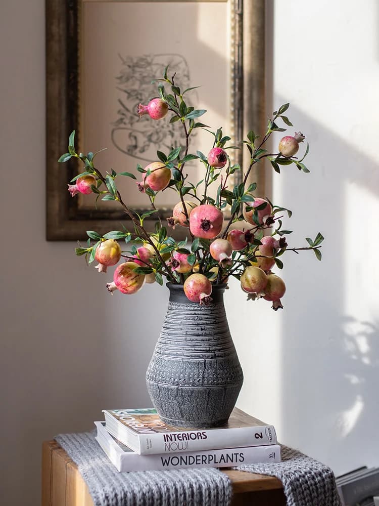 Artificial flower in the form of pomegranate, decorative ornament, symbol of many seeds and many blessings, ideal for floral compositions