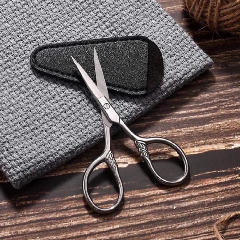 Small stainless steel scissors for eyebrow makeup and care, for manicure, cuticles, beard, mustache and nose hair.