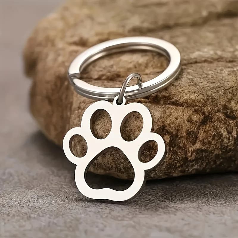 1 men's stainless steel dog paw keychain, cartoon dog paw silver fashion keychain, car keychain, pet collar, decorative hollow paw pendant, men's keychain.