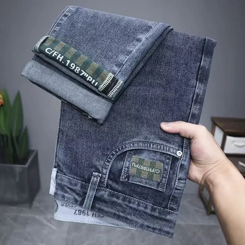 Jeans da uomo primavera autunno elastico sottile dritto abbigliamento da lavoro casual resistente all'usura protezione del lavoro pantaloni lunghi denim elasticizzato in cotone