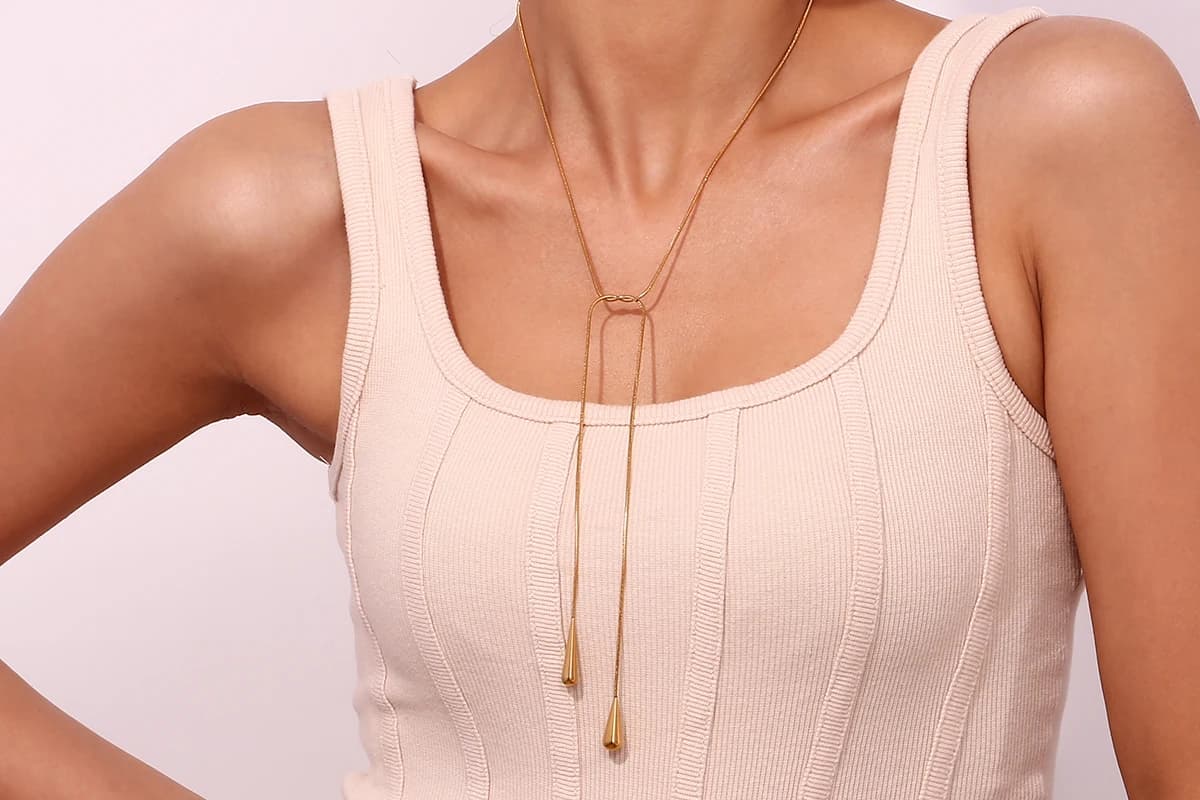 Collana con due catene a forma di serpente con gocce d'acqua, accessori in acciaio inossidabile color argento senza appannamento, catena al collo da donna placcata in oro 18 carati