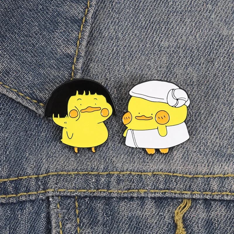 Stylish yellow duckling with mushroom head, decoration for clothes, backpacks and bathrobes