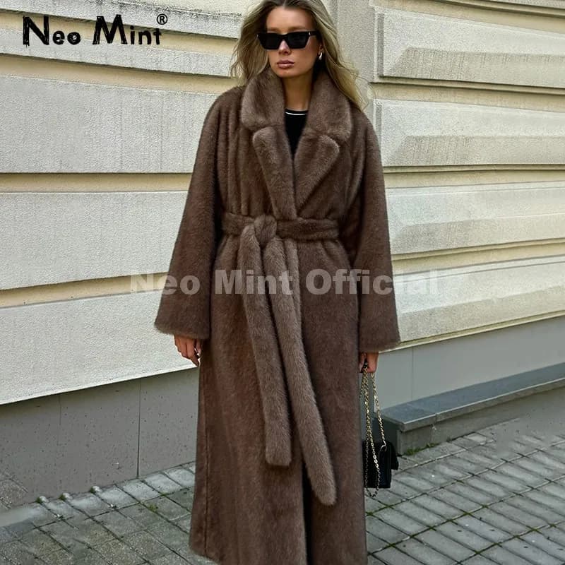 Cappotto in pelliccia di visone finto con cintura Neo Mint Donna 2025 Giacca invernale in pelliccia pelosa sfumata beige Cappotto caldo con cappuccio di marca di lusso