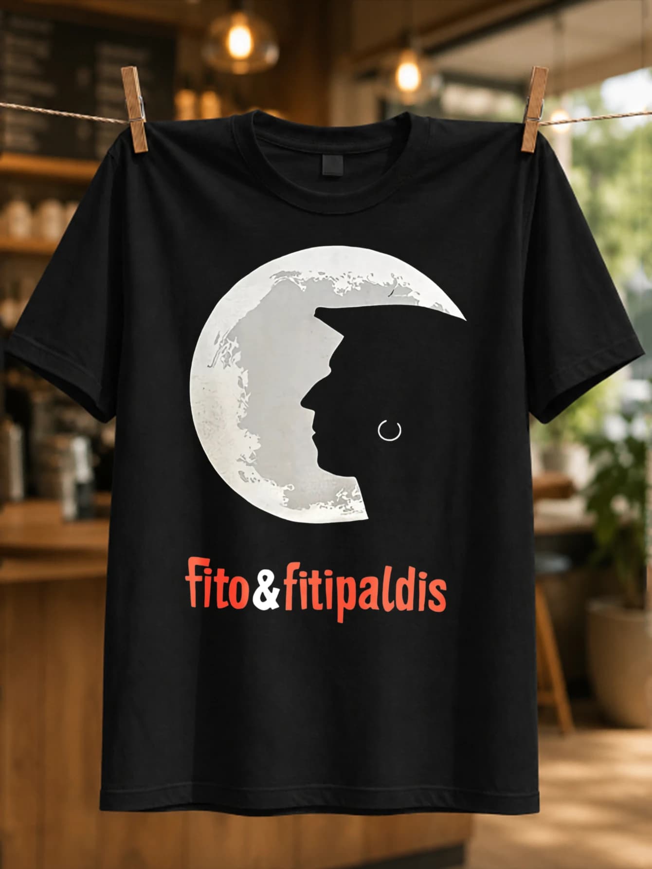 Fito & Fitipaldis moon silhouette profile with orange band lettering clean Spanish rock minimalist Unisex All T-Shirt