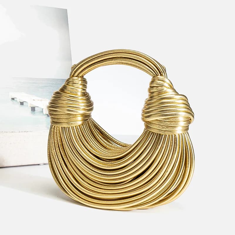 Borse per le donne 2025 Nuovo marchio di design di lusso in oro Borse per noodle intrecciate a mano Corda annodata tirata Hobo Argento Frizione da sera Chic