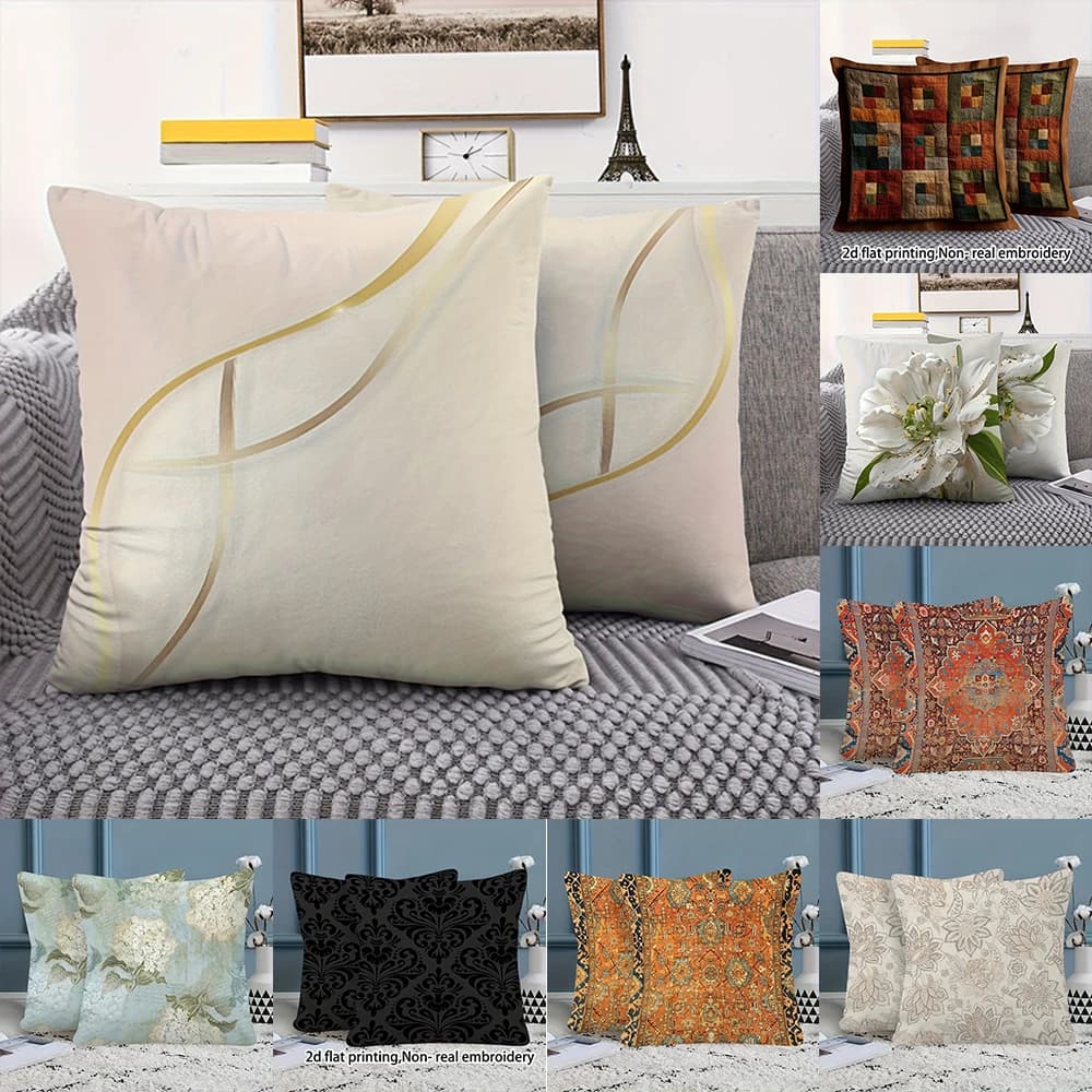 2 cuscini beige con linee dorate, adatti per fodere decorative per camere da letto, soggiorni e divani.