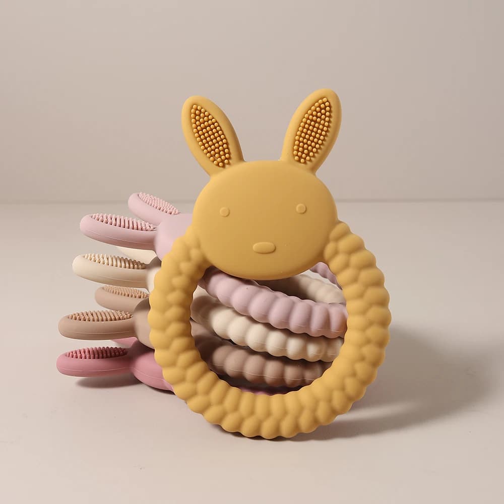 Massaggiagengive in silicone regalo per bambini Cartone animato a forma di coniglietto pasquale simpatico giocattolo per la dentizione succhietto per alleviare la gomma sensoriale con perline da masticare