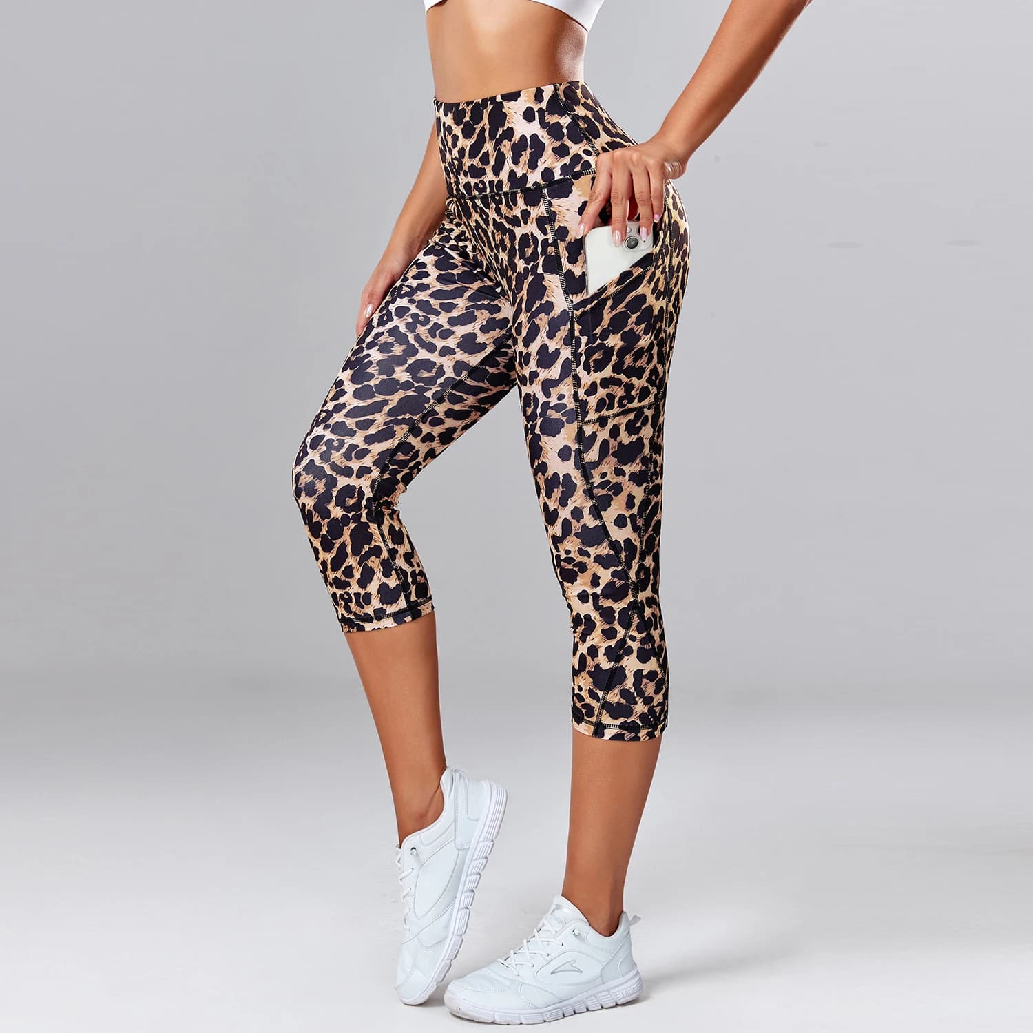 Leggings capris con stampa leopardata Pantaloni da yoga a vita alta da donna con tasche laterali Calzamaglia sportiva da palestra ad asciugatura rapida Abbigliamento fitness