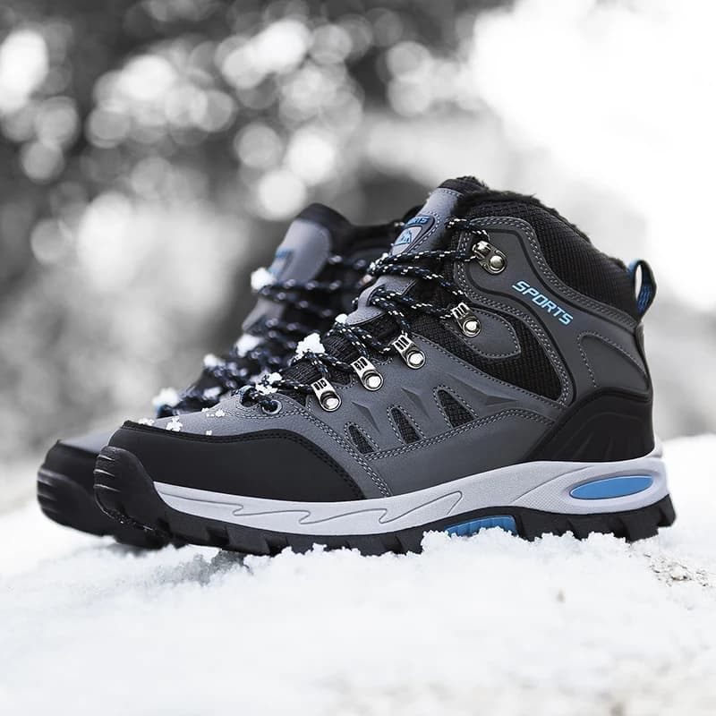 Le scarponi da trekking da uomo forniscono il comfort caldo negli stivali da neve invernali sono scarpe sportive traspiranti impermeabili resistenti all'usura antiscivolo