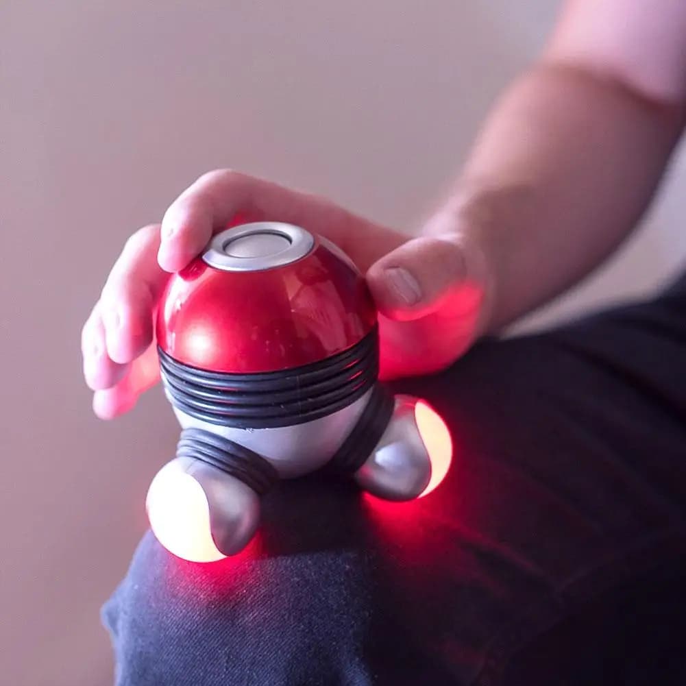 Hand held portable vibrating massager with tool to relieve pain in the head, neck, legs, compact design and easy to use