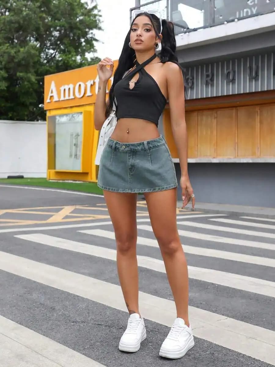 Minigonna in denim da donna a trapezio con vita alta e orlo sfrangiato