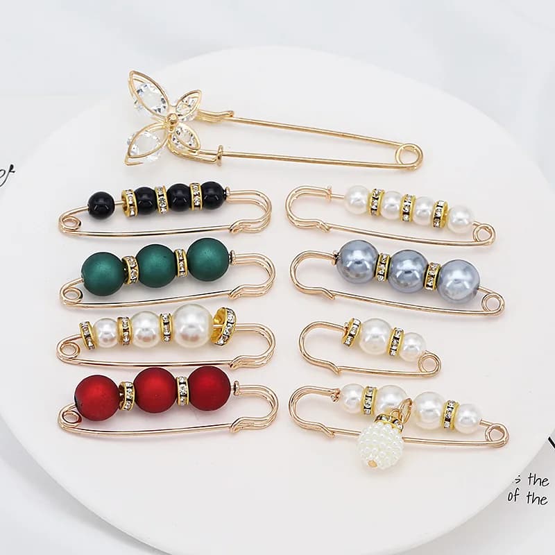 Donna nuova carina perla imitazione spilla con strass gonna anti-illuminazione spilla in vita accessori gioielli di moda regali