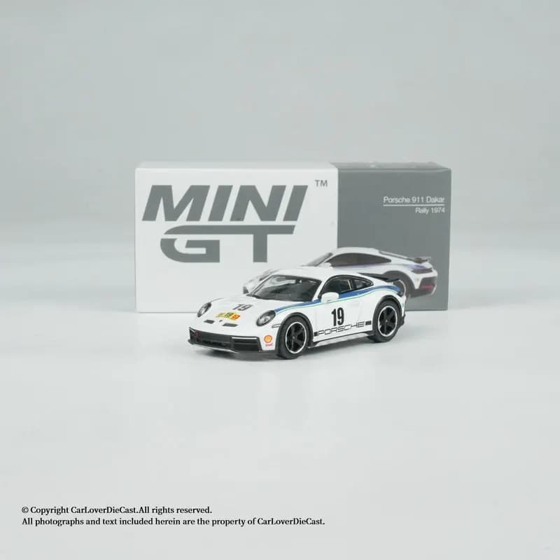 MINI GT 1:64 # 1009 Porsche 911 (992) Dakar “Rally 1974” Modello in lega bianca pressofusa, auto da collezione con licenza ufficiale per Disp