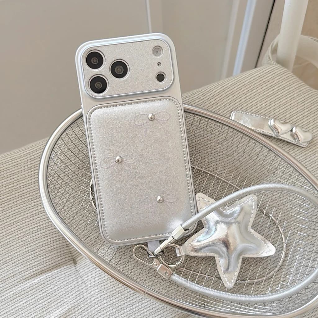 Custodia per telefono antiurto con fiocco semplice in similpelle, perline argentate e ciondolo a stella, con laccetto, per iPhone 17 16 15 14 Pro Max