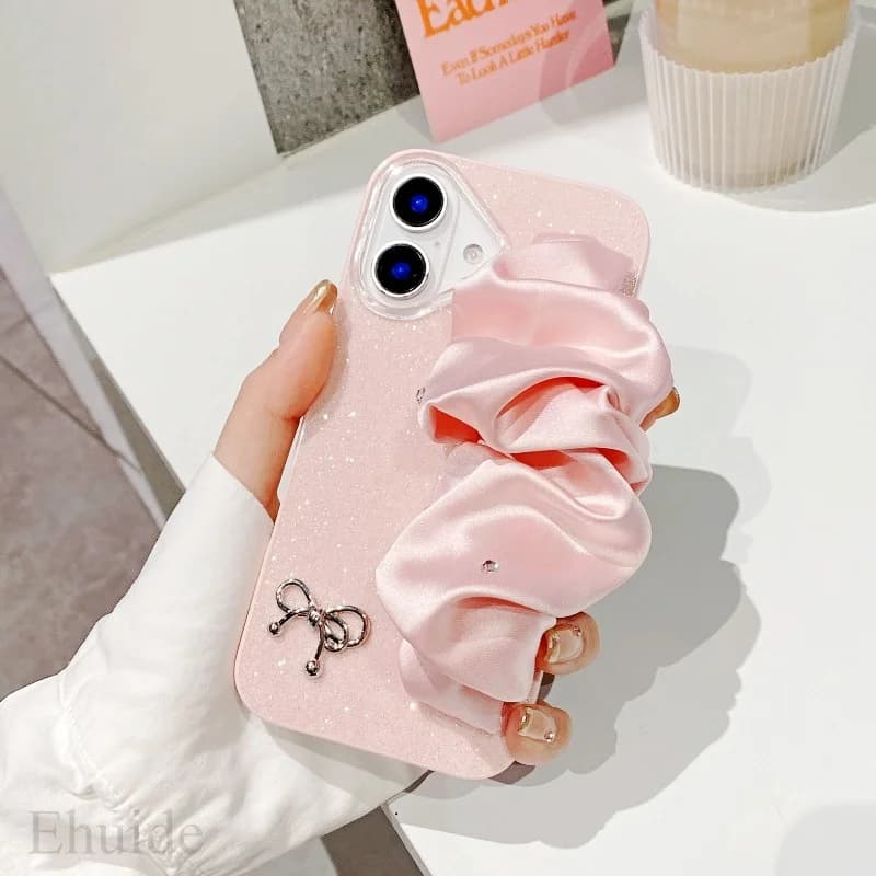 Custodia con cinturino da polso glitterato per iPhone 16 Pro Max 14 12 17 13 15 Plus 16E Cover antiurto con diamante in plastica con cordino principessa di lusso