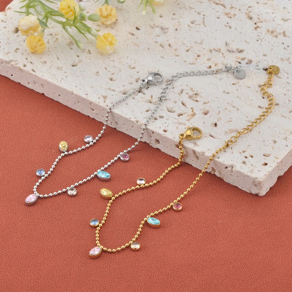 JeeMango Collana con bracciale in zircone di cristallo multicolore in acciaio inossidabile per le donne Regalo di gioielli per feste di nozze delicati alla moda B25194