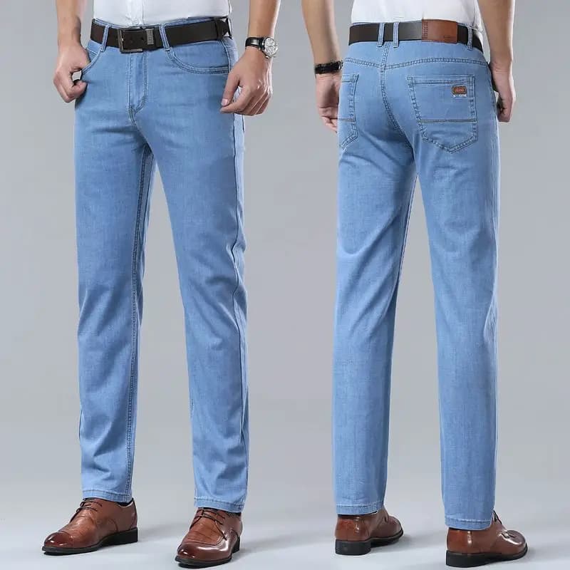 Jeans in denim sottile in seta ghiaccio primavera estate 2026 da uomo, pantaloni blu dritti elasticizzati in cotone, casual eleganti e leggeri