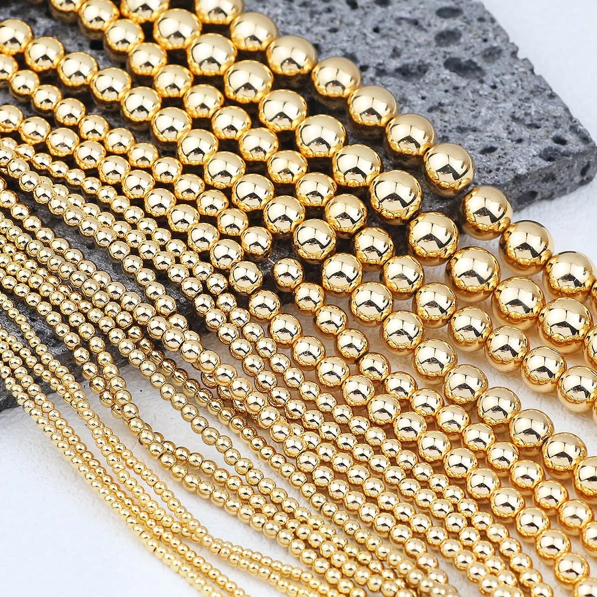 Perline rotonde di ematite dorata Perline distanziatrici allentate per gioielli Braccialetti fai da te Orecchini Pendenti Accessori 2/3/4/6/8/10mm