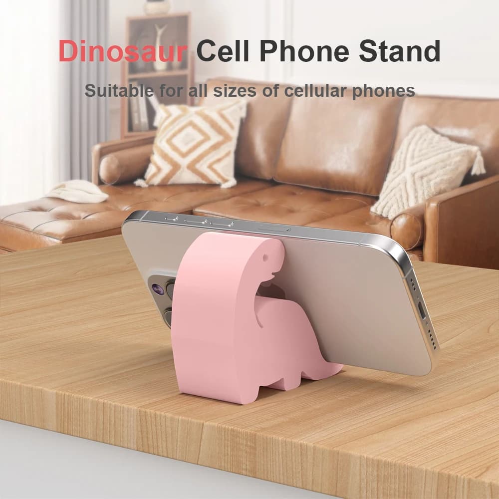 Simpatico supporto per telefono con dinosauro, realizzato in plastica, resistente e non facile da rompere. Adatto per scrivanie, scrivanie informatiche, ecc.