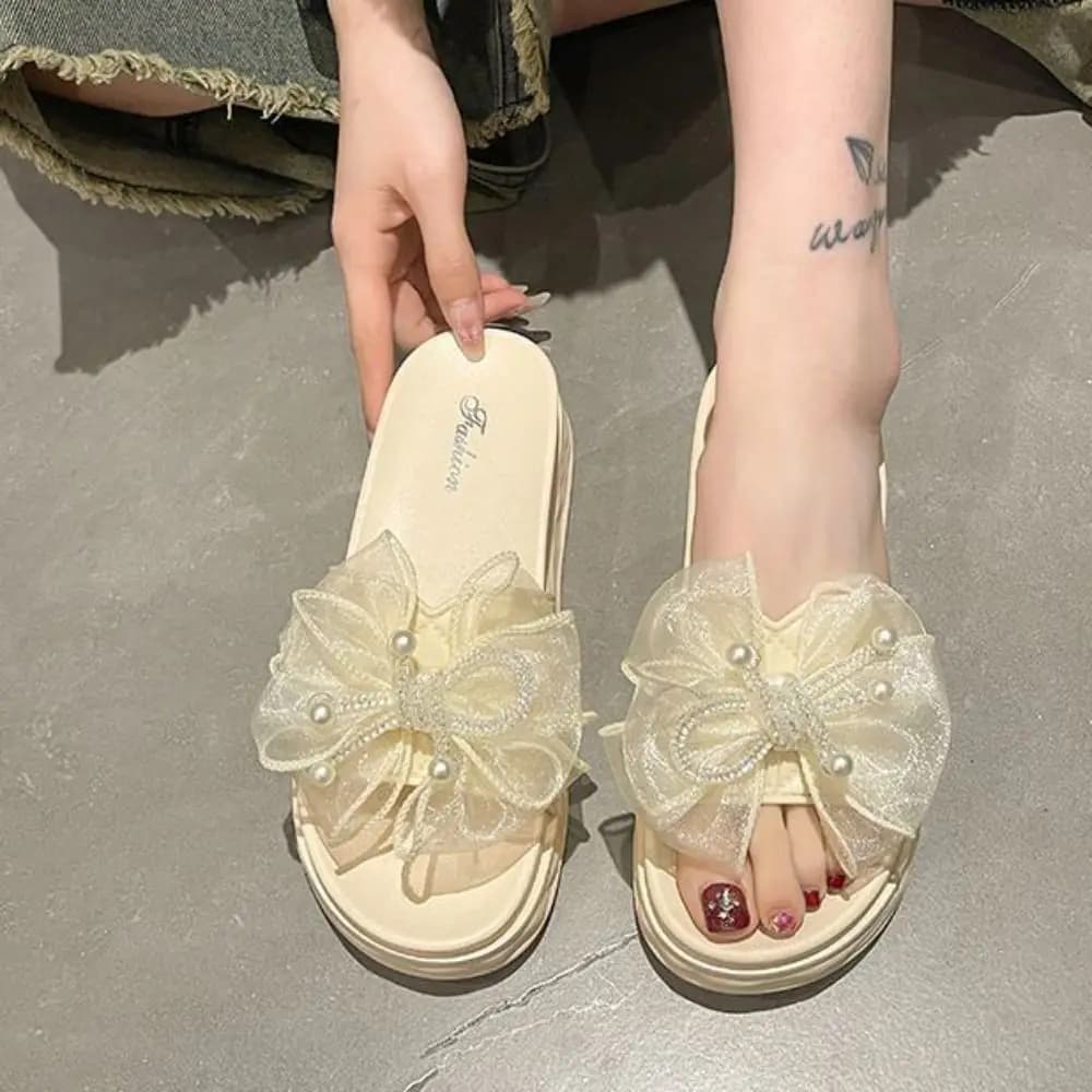 Eleganti pantofole con fiocco in rete con suola morbida Sandali con diapositive piatte dolci in PVC Scarpe antiscivolo Pantofole con fiocco in strass Abbigliamento da spiaggia