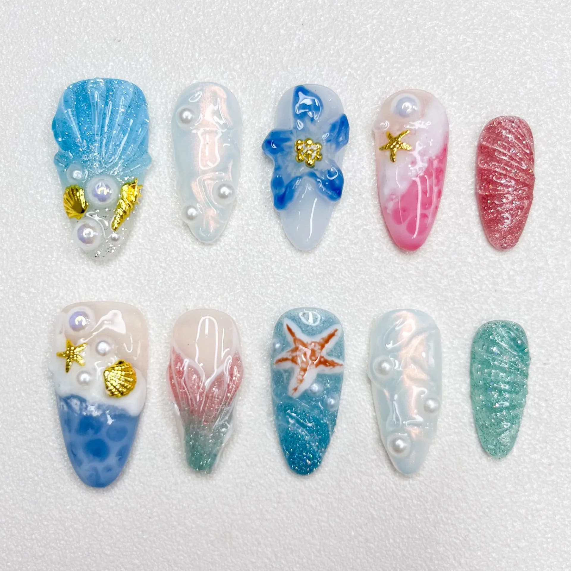 Nuova serie Ocean Nail Art Serie di intarsio di conchiglie di stelle marine Serie di anatre mandarine Nail Art Lunghezza mandorla Unghie finte Rilievo 3D