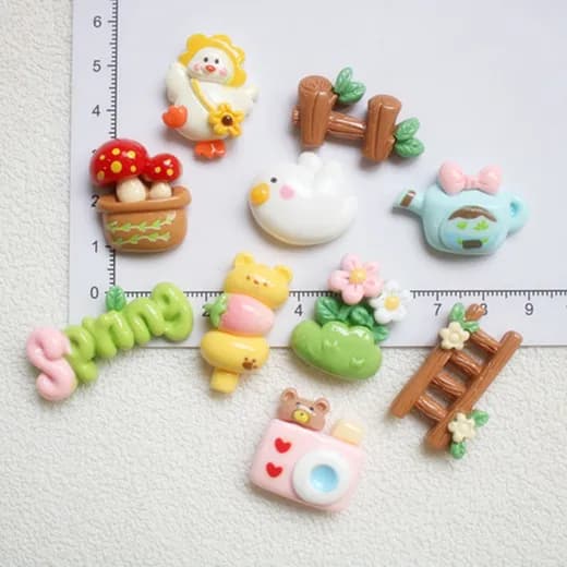 Accessori in resina all'ingrosso per la creazione di fermagli per capelli e decorazioni per scarpe, serie primaverile con animali dei cartoni animati, per creazioni fai da te con colla creme.