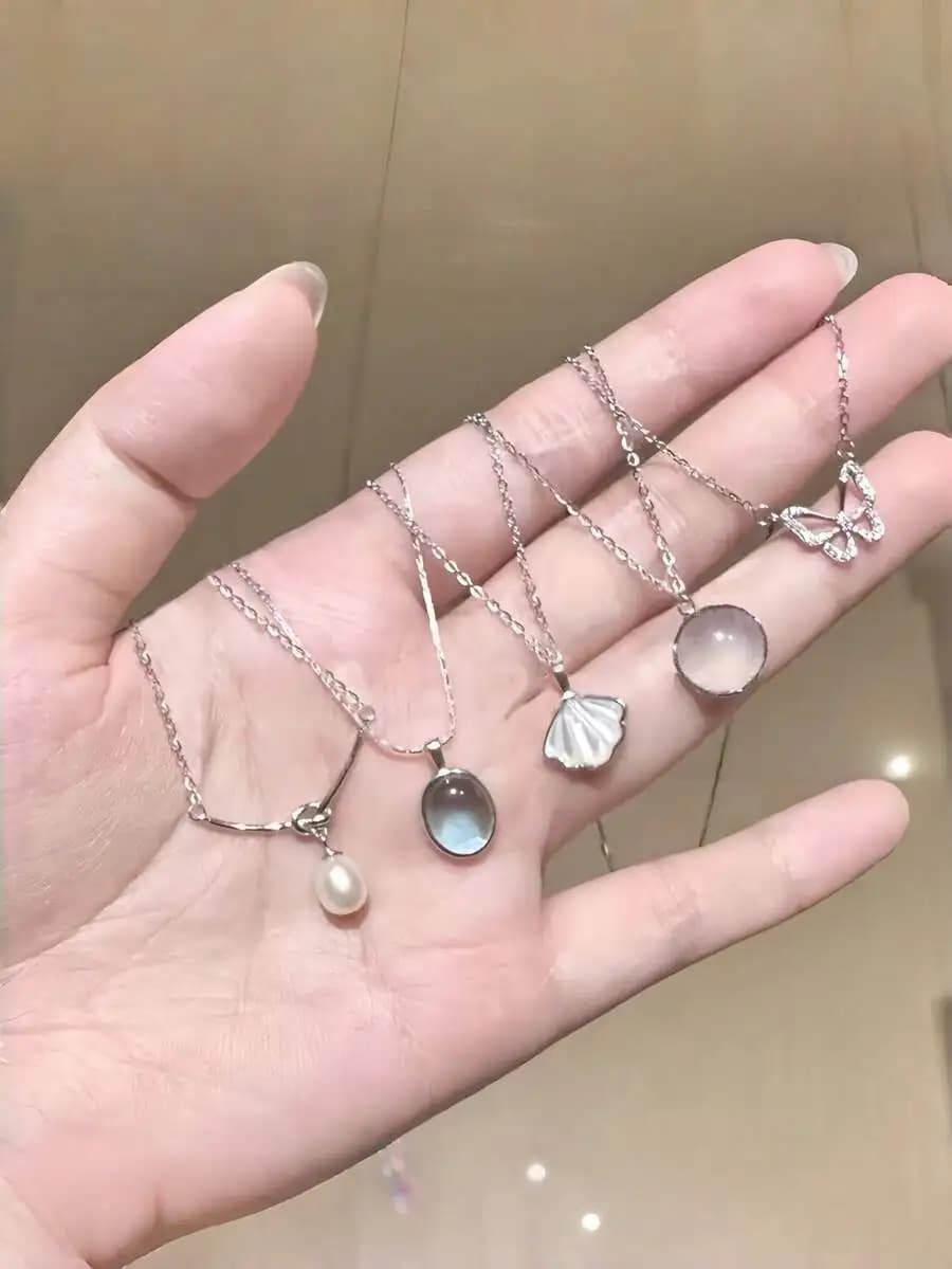 A set of 5 elegant necklaces featuring white jade and moonstone, a minimalist and versatile luxury choker necklace.