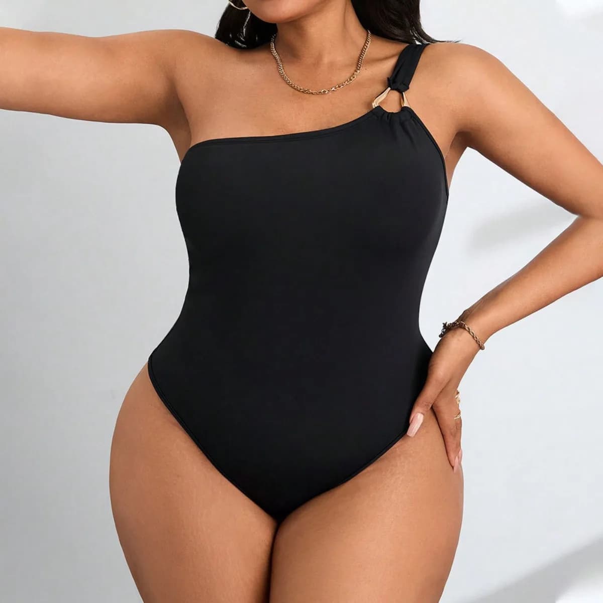 Women's full size sexy mono-shoulder with gold ring detail, solid color, modeling pants that define life