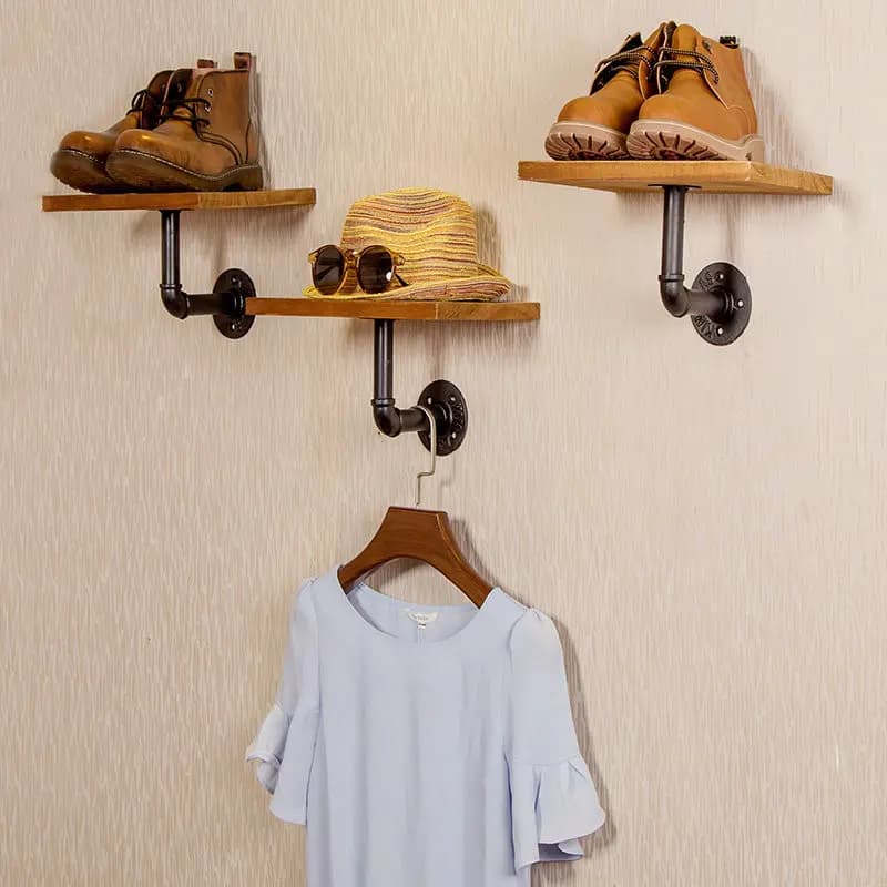 Wall hanger with hook for hanging clothes