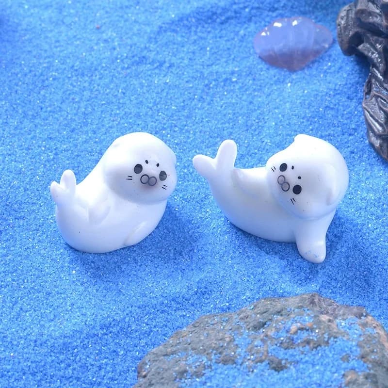 Miniature di leoni marini per micro paesaggi, graziose decorazioni in resina a forma di focale per acquari, piccoli ornamenti e accessori fai da te.