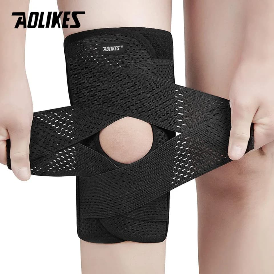 AOLIKES 1PCS Ginocchiera per compressione del dolore al ginocchio Supporto per ginocchio con stabilizzatori laterali in tessuto a rete d'aria Sollievo dall'artrite ACL