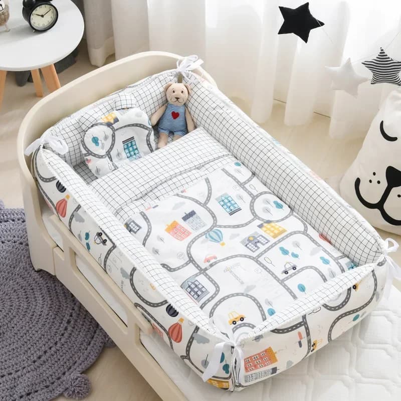 Culla portatile multifunzionale-letto centrale staccabile nido bionico Mobile letto da gioco per bambini in cotone per lo Styling del fumetto con cuscino