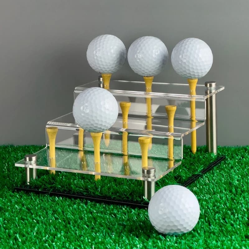 Lo stand display per appassionati golf contiene 9 palline acriliche a livello con erba sintetica presentazione
