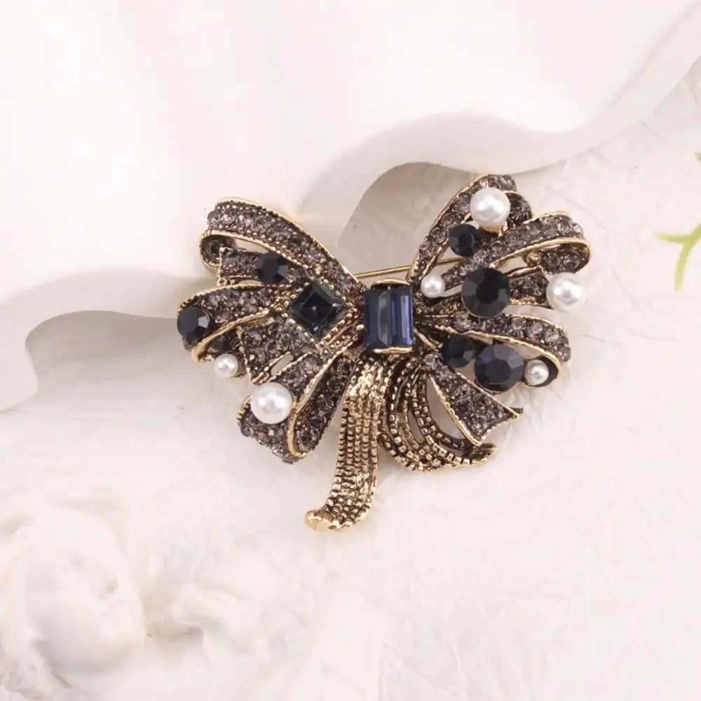 A Perfect Gift! This Exquisite Retro Bow Brooch Pin Elegantly Adorns Sweaters, Coats, or Backpacks for Any Women's Festival