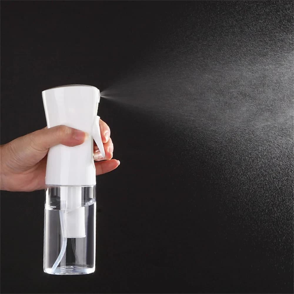 Flacone spray ricaricabile a nebbia continua da 200 ml Spruzzatore disinfettante portatile a nebbia ultrafine ad alta pressione per lo styling dei capelli pulito