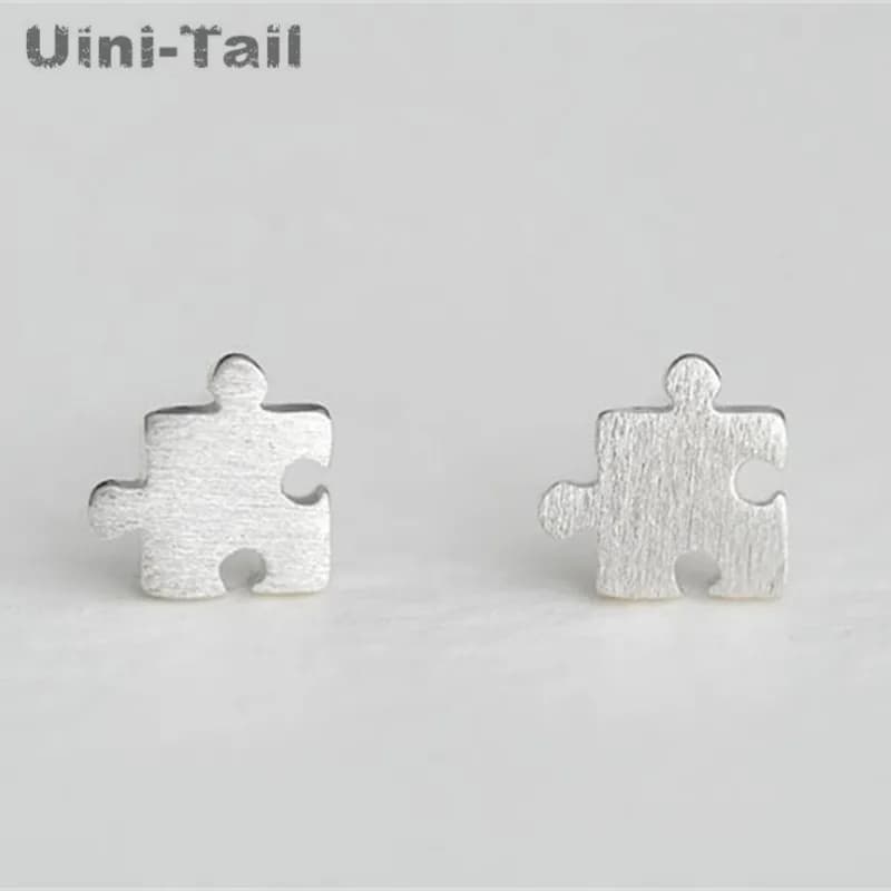 925 Tibetan silver child-friendly puzzle earrings wholesale Korean version of the simple wild cute live wave high quality ED296
