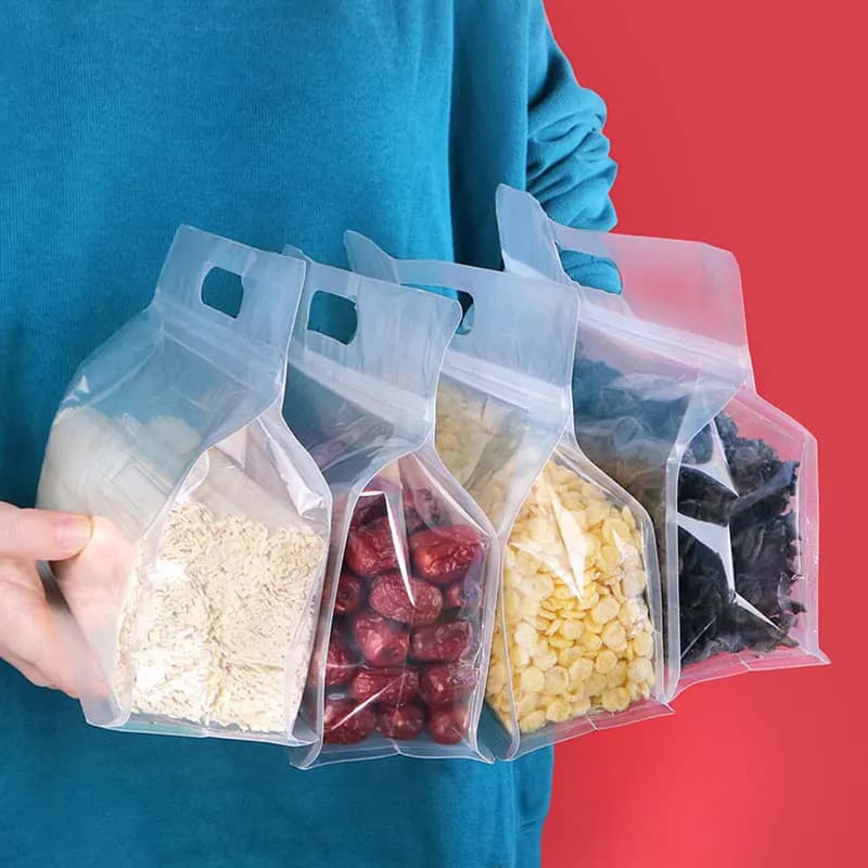 Nuovo pacchetto da 50 pezzi sacchetto per imballaggio alimentare sigillo a chiusura lampo addensare sacchetti per snack di frutta secca PE sacchetto per imballaggio portatile trasparente