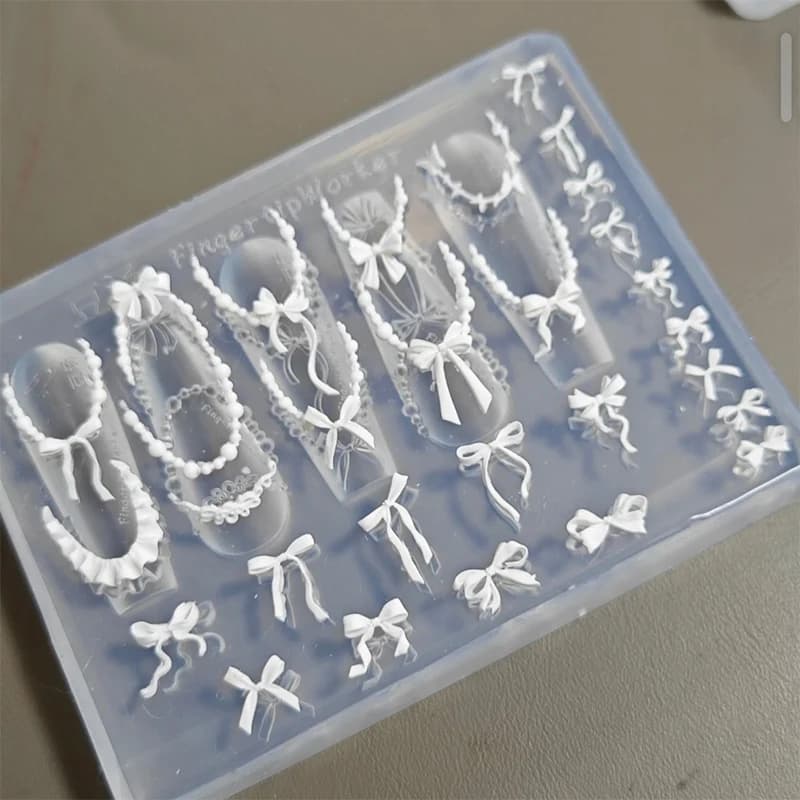 Design fai da te in silicone Bowknot Bead Chain Nastro Stampo acrilico 3D Decorazioni per nail art Modello di stampo per nail art per ciondoli per unghie