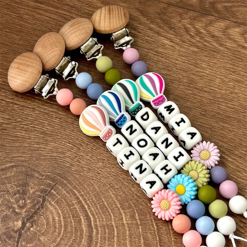 Clip per ciuccio personalizzate con perline in silicone - con clip in legno, mongolfiera e decorazioni floreali - Nomi personalizzabili per neonati
