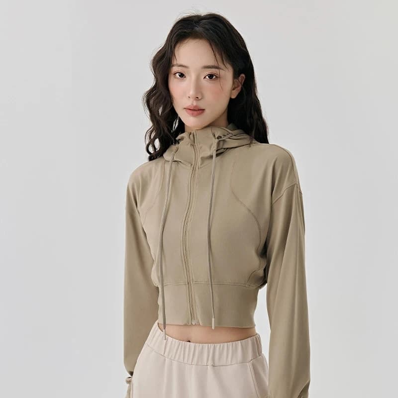 Giacca sportiva corta da donna con cappuccio sottile allentata Cappotto con cerniera Outdoor Casual Versatile Abbigliamento da yoga Fitness Corsa Allenamento Top Panno
