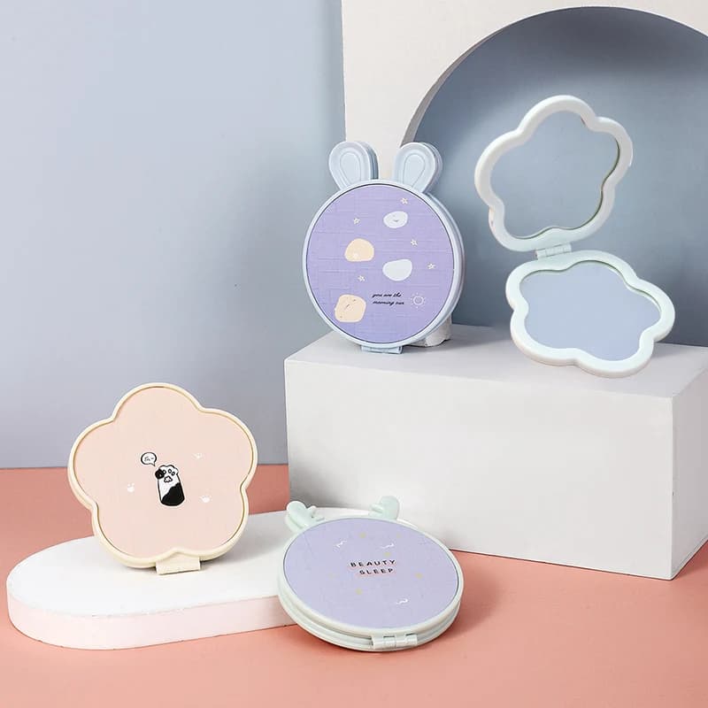 Strumento di bellezza cosmetico tascabile compatto a mano portatile con mini specchio per il trucco pieghevole a doppio lato