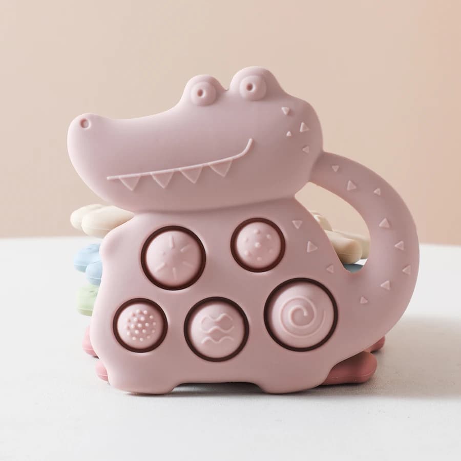 Giocattolo per massaggiagengive in silicone per bambini Denti per massaggiagengive senza BPA Accessori per neonati per neonati Dinosauro del fumetto Giocattoli per dentizione lenitivi per neonati